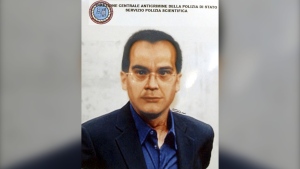 FILE - This photo reproduction of a computer generated image released by Italian Police of Mafia top boss contender Matteo Messina Denaro, is displayed at the Palermo police headquarters, Italy, Thursday, April 6, 2007. Matteo Messina Denaro, a convicted mastermind of some of the Sicilian Mafia’s most heinous slayings, died on Monday, Sept. 25, 2023, in a hospital prison ward, several months after being captured as Italy’s No. 1 fugitive and following decades on the run, Italian state radio said. (AP Photo/Alessandro Fucarini, File)
