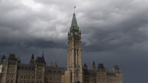 Storm clouds pass by the Peace Tower and Parliament Hill on Tuesday August 18, 2020 in Ottawa. Dozens of civil society organizations, experts and academics are calling on the Liberal government to remove proposed measures on artificial intelligence from a federal privacy bill, saying they must be considered separately.THE CANADIAN PRESS/Adrian Wyld