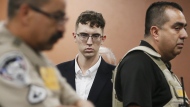 FILE - El Paso Walmart shooting suspect Patrick Crusius pleads not guilty during his arraignment, Oct. 10, 2019, in El Paso, Texas. On Monday, Sept. 25, 2023, Crusius, the white gunman who killed 23 people in a racist attack on Hispanic shoppers at a Texas Walmart in 2019, agreed to pay more than $5 million to families of the victims. (Briana Sanchez/The El Paso Times via AP, Pool, File)