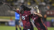 Canada's Nichelle Prince, left, celebrates her goal against Jamaica with teammate Adriana Leon, during a CONCACAF women's championship soccer series match in Kingston, Jamaica, Friday, Sept. 22, 2023. Canada women's soccer head coach Bev Priestman says her squad is ready to take another step forward on Tuesday. THE CANADIAN PRESS/AP/Collin Reid