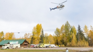 A police helicopter takes off from a staging area at Purden Lake Resort near the site of a helicopter crash, east of Prince George, B.C., on Tuesday, Sept. 26, 2023. THE CANADIAN PRESS/James Doyle