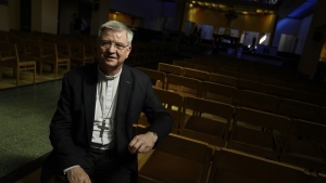 FILE - Bishop of Antwerp, Johan Bonny, poses for a portrait at a church in Lier, Belgium, on May 24, 2023. Bonny, a prominent Belgian bishop on Wednesday, Sept. 27, 2023, criticized the Vatican for failing to defrock a former bishop who admitted sexually abusing children, saying it had led to massive frustration with the highest Roman Catholic authorities. Disgraced bishop Roger Vangheluwe, who was brought down by a sexual abuse scandal 13 years ago, became a symbol in Belgium of the Roman Catholic church's hypocrisy in dealing with abuse in its own ranks. (AP Photo/Virginia Mayo)

