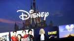 Disney Plus is joining the crackdown on password sharing, telling its subscribers this week it was introducing new guidelines around household account usage. A Disney logo forms part of a menu for the Disney Plus streaming service on a computer screen in Walpole, Mass., on Nov. 13, 2019. THE CANADIAN PRESS/AP-Steven Senne