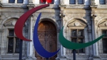 FILE - The logo of the Paris 2024 Paralympic Games is pictured in front of the Paris town hall, France, Friday, Nov. 10, 2017. Votes are taking place Friday, Sept 29, 2023, on whether to “partially suspend” Russia from the International Paralympic Committee. That could mean Russia sends competitors to the Paralympics in Paris next year but that they have to compete as neutral athletes without national symbols. (AP Photo/Christophe Ena, File)
