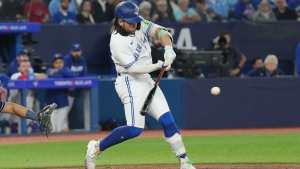 Toronto Blue Jays' Bo Bichette hits a RBI double during seventh inning American League MLB baseball action in Toronto, Friday, Sept. 29, 2023. THE CANADIAN PRESS/Chris Young