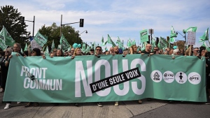 People take part in a public sector union demonstration in Montreal, Saturday, September 23, 2023. Members of several Quebec public-sector unions are continuing to vote in favour of strike mandates by large margins. THE CANADIAN PRESS/Graham Hughes