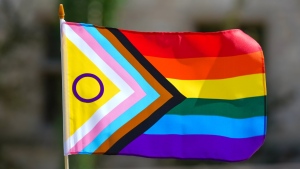 A pride flag is photographed during a Pride flag raising ceremony in Saskatoon on June 1, 2023. Police say four male youths have been arrested and are facing multiple hate-related charges after a Pride flag from an Ontario high school was lit on fire. The Waterloo Regional Police say the flag was damaged on the afternoon of Sept. 21. THE CANADIAN PRESS/Heywood Yu