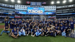 Toronto Blue Jays on the field after clinching a berth in the American League divisional series, following an AL MLB baseball game against the Tampa Bay Rays, in Toronto, Sunday, Oct. 1, 2023. THE CANADIAN PRESS/Frank Gunn
