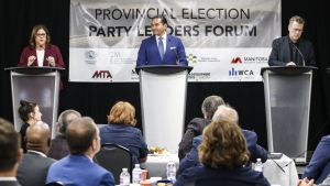 Manitoba provincial party leaders, from left, Heather Stefanson (PC), Wab Kinew (NDP) and Dougald Lamont (Liberals) speak at the Party Leaders Forum – Growing the Economy in Winnipeg on Sept. 12, 2023. THE CANADIAN PRESS/John Woods