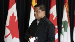 Minister of Crown-Indigenous Relations Gary Anandasangaree walks past members of the media during the Liberal Cabinet retreat in Charlottetown, Tuesday, Aug. 22, 2023. THE CANADIAN PRESS/Darren Calabrese
