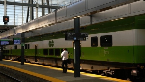 A man walks along an empty platform as a train stands idle at Toronto's Union Station after GO Transit and UP Express announced that trains are not running on the entire network due to a networkwide system failure on Tuesday October 3, 2023. THE CANADIAN PRESS/Chris Young