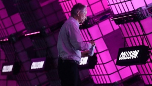 Geoffrey Hinton, known as the "Godfather of AI," leaves the stage after speaking at the Collision conference in Toronto on Wednesday, June 28, 2023. THE CANADIAN PRESS/Chris Young