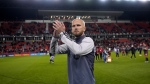 Toronto FC midfielder Michael Bradley (4) applauds to the crowd at the end of second half MLS soccer action in Toronto on Saturday, Oct. 21, 2023. This was Bradley's final game of his MLS career. THE CANADIAN PRESS/Nathan Denette