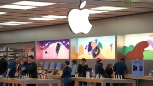 Customers shop in an Apple store in Pittsburgh Jan. 30, 2023. Apple reports earnings on Thursday, Nov. 2, 2023. (AP Photo/Gene J. Puskar, File)