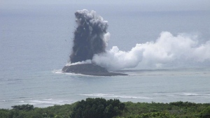 In this photo provided by the Japan Maritime Self-Defense Force, steam billows from the waters off Ioto island, Ogasawara town in the Pacific Ocean, southern Tokyo, on Nov. 1, 2023. An unnamed undersea volcano, located about 1 kilometer (half a mile) off the southern coast of Iwo Jima, which Japan calls Ioto, started its latest series of eruptions on Oct. 21. (Japan Maritime Self-Defense Force via AP)