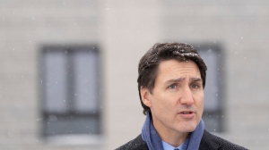 Prime Minister Justin Trudeau responds to news that two Jewish schools in Montreal were targeted with gunfire during an announcement in Longueuil, Que., Thursday Nov. 9, 2023. THE CANADIAN PRESS/Christinne Muschi