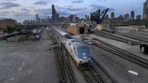 An Amtrak passenger train departs Chicago on Wednesday, Sept. 14, 2022, in Chicago. Amtrak is making a sales pitch to connect its lines in Detroit to Via Rail tracks across the border, hoping to lay the ground for passenger service between Toronto and Chicago.THE CANADIAN PRESS/AP/Charles Rex Arbogast