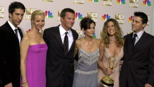FILE - David Schwimmer, from left, Lisa Kudrow, Matthew Perry, Courteney Cox, Jennifer Aniston and Matt LeBlanc pose after "Friends" won outstanding comedy series at the 54th Primetime Emmy Awards on Sept. 22, 2002, in Los Angeles. Cast members are sharing more remembrances of Perry in their first personal social media posts since the actor’s death on Oct. 28. (AP Photo/Reed Saxon, File)