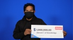 Abinesh Thiyagarajah with his prize money. (OLG)