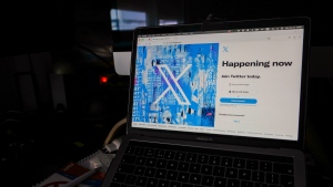 FILE - A view of a laptop shows the Twitter sign-in page with their the new logo, in Belgrade, Serbia, Monday, July 24, 2023. IBM has stopped advertising on social media platform X, Thursday, Nov. 16, after a report that its ads were appearing alongside material praising Adolf Hitler and the Nazis, in a fresh setback for the company's plans to win back big brands and their ad dollars. (AP Photo/Darko Vojinovic, File)