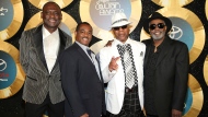 FILE - George Brown, from left, Ronald Bell, Dennis Thomas and Robert "Kool" Bell, of Kool and the Gang, appear at the 2014 Soul Train Awards in Las Vegas on Nov. 7, 2014. Brown died Nov. 16, 2023 in Los Angeles, after a battle with cancer. He was 74. (Photo by Omar Vega/Invision/AP, File)