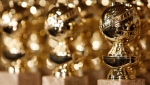 FILE - In this Jan.. 6, 2009, file photo, Golden Globe statuettes are seen during a news conference at the Beverly Hilton Hotel in Beverly Hills, Calif. The 2024 Golden Globe Awards will be broadcast on CBS. (AP Photo/Matt Sayles, File)