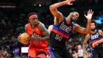 Toronto Raptors forward Pascal Siakam (43) is fouled by Detroit Pistons guard Alec Burks (14) as he drives to the net during second half NBA basketball action in Toronto, Sunday, Nov. 19, 2023. THE CANADIAN PRESS/Christopher Katsarov