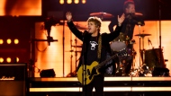 Green Day's Billie Joe Armstrong performs during the halftime show at the 110th CFL Grey Cup between the Montreal Alouettes and the Winnipeg Blue Bombers in Hamilton, Ont., on Sunday, November 19, 2023. THE CANADIAN PRESS/Nick Iwanyshyn