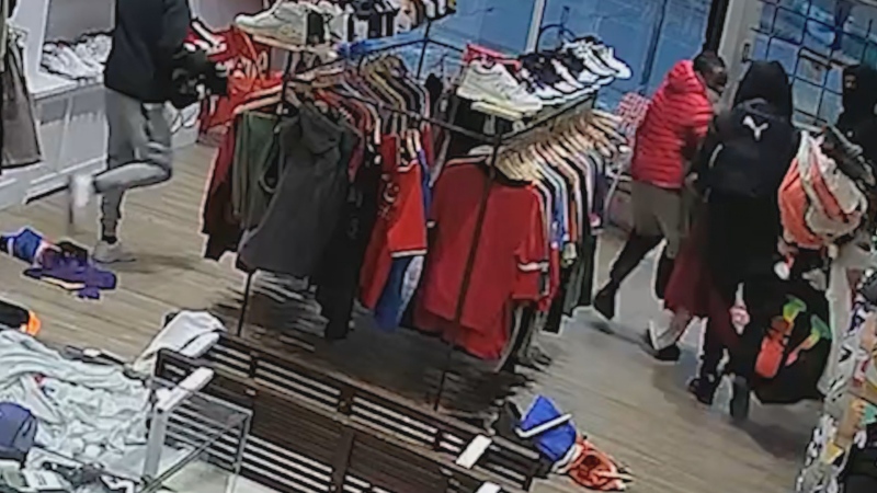 Security video from a Mississauga store shows suspects grabbing clothes and shoes during a robbery on Friday, Nov. 17, 2023.
