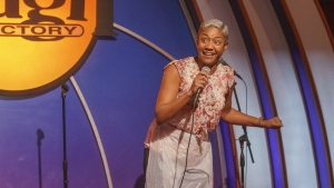Stand-up comedian and actress Tiffany Haddish entertains guests at Laugh Factory Hollywood, during its free Thanksgiving meal Thursday, Nov. 23, 2023, in Los Angeles. (AP Photo/Damian Dovarganes)