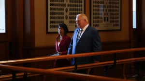 Ontario Premier Doug Ford returns to his office with Toronto Mayor Olivia Chow after their post meeting news conference at the Queens Park Legislature in Toronto on Monday, Sept. 18, 2023.THE CANADIAN PRESS/Chris Young 