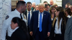 Former President Donald Trump walks out of the courtroom after testifying at New York Supreme Court, Monday, Nov. 6, 2023, in New York. (AP Photo/Eduardo Munoz Alvarez)