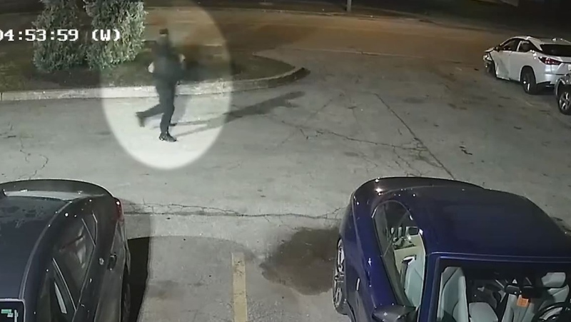 An image of a suspect firing several shots at a vehicles parking at a Vaughan business on Nov. 26. (screengrab from YPS video)