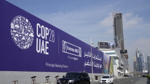 Cars pass by a billboard advertising COP28 at Sheikh Zayed highway in Dubai, United Arab Emirates, Monday, Nov. 27, 2023. Canada’s image at the world’s signature climate negotiations could be complicated by infighting, some observers fear, as two of the federal government’s ardent critics at the provincial level look to capture attention at the United Nations climate summit known as COP28.THE CANADIAN PRESS/AP-Kamran Jebreili
