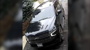 Image of a newer model black Chevrolet Tahoe RST police believe the suspects were last seen driving. Photo provided by Halton Regional Police Service