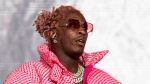 FILE - Young Thug performs at the Lollapalooza Music Festival in Chicago on Aug. 1, 2021. Opening statements are expected next week in Atlanta in the trial of rapper Young Thug, who’s accused of co-founding a violent criminal street gang and using his music to promote it. (Photo by Amy Harris/Invision/AP, File)