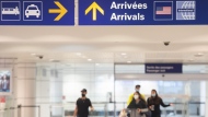 A clear majority of Canadians say higher immigration is fuelling the housing crisis and putting pressure on the health care system, a new Leger poll suggests. Travellers arrive at Trudeau Airport in Montreal, Wednesday, April 20, 2022. THE CANADIAN PRESS/Graham Hughes
