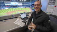 Toronto Blue Jays announcer Ben Wagner sits in the broadcast booth in Toronto, Sunday, April 10, 2022. Wagner will not return to the team's broadcast booth next year.THE CANADIAN PRESS/Frank Gunn
