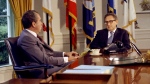 FILE - Newly appointed Secretary of State Henry Kissinger sits with President Richard Nixon in the Oval Office in Washington D.C. in this Sept. 21, 1973 photo. (AP Photo) 