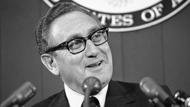 FILE - Secretary of State Henry Kissinger briefs reporters, Oct. 12, 1973, at the State Department in Washington. Kissinger, the diplomat with the thick glasses and gravelly voice who dominated foreign policy as the United States extricated itself from Vietnam and broke down barriers with China, died Wednesday, Nov. 29, 2023. He was 100. (AP Photo, File)