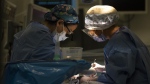 An Ontario-based study published today suggests patients treated by female surgeons incur lower health-care costs than those with male surgeons. A surgery is performed in the operating room in Toronto's Hospital for Sick Children on Wednesday, Nov. 30, 2022. THE CANADIAN PRESS/Chris Young