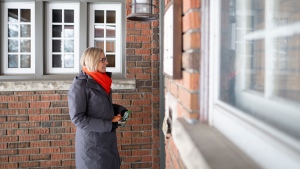 Debbie Chapman, the New Democratic Party's candidate in the Nov. 30th Ontario byelection for MPP Kitchener Centre, canvasses door to door in Kitchener, Ont., Tuesday, Nov. 28, 2023. THE CANADIAN PRESS/Peter Power
