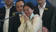 Nutthawaree Munkan, a Thai hostage who was freed from Hamas, talks to reporters after arriving at Suvarnabhumi International Airport in Samut Prakarn Province, Thailand, Thursday, Nov. 30, 2023. Twenty-three Thai hostages kidnapped by Hamas in its Oct. 7, 2023 attack on southern Israel have been freed so far, and Thailand's foreign ministry says nine remain in captivity in Gaza. There were about 30,000 Thai overseas workers in Israel, mostly in the agricultural sector, but more than 8,000 have returned home since the attack. (AP Photo/Sakchai Lalit)