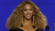 FILE - Beyonce appears at the 63rd annual Grammy Awards in Los Angeles on March 14, 2021. Beyoncé releases a concert film this week titled "Renaissance: A Film by Beyoncé ." (AP Photo/Chris Pizzello, File)