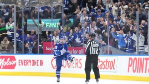 Toronto Maple Leafs' Mitchell Marner celebrates scoring the shootout winner against the Seattle Kraken in NHL hockey action in Toronto, on Thursday, November 30, 2023.THE CANADIAN PRESS/Chris Young