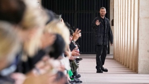 Designer Matthew M. Williams gestures after presentation a creation for Givenchy Menswear Spring/Summer 2024 fashion collection in Paris, Thursday, June 22, 2023. (AP Photo/Michel Euler)