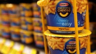 A standout display holds Kraft Macaroni & Cheese, part of the Kraft Foods Inc. family of brands and products, are seen at a Ralphs Fresh Fare supermarket in Los Angeles Wednesday, Feb. 9, 2011. The Kraft Heinz Co. said Wednesday it's bringing dairy-free macaroni and cheese to the U.S. for the first time.   (AP Photo)