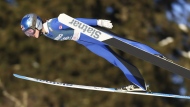 Canada's Alexandria Loutitt competes in the large hill HS 140 ski jumping event, during the World Cup, in Lillehammer, Norway, Sunday, Dec. 3, 2023. (Geir Olsen/NTB Scanpix via AP)