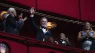 2023 Kennedy Center Honoree, comedian Billy Crystal, center, waves as he is applauded by fellow honorees Dionne Warwick and Queen Latifah, at the 46th Kennedy Center Honors at the John F. Kennedy Center for the Performing Arts in Washington, Sunday, Oct. 3, 2023. (AP Photo/Manuel Balce Ceneta)