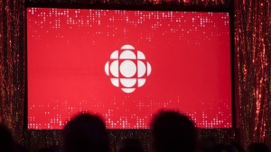 The CBC logo is projected onto a screen in Toronto on May 29, 2019. THE CANADIAN PRESS/Tijana Martin
